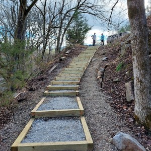 Rodney and Allison check the 28 stairs that have been installed. After 7 hours of step installation. It was great to look back on our work. Rodney and Allison check the 28 stairs that have been installed. After 7 hours of step installation. It was great to look back on our work.