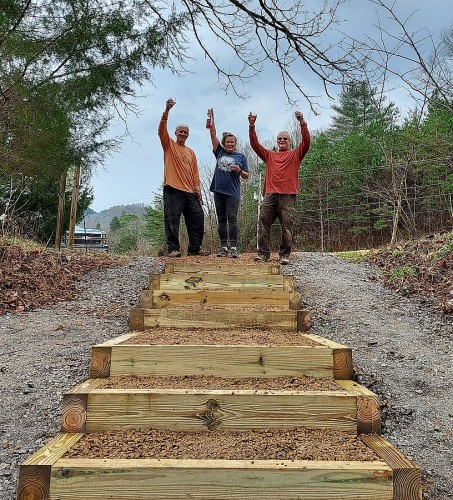 A Time to Celebrate! Rodney, Allison and Mark after some of the toughest work done on the TRWA to-date. 64 man/women hours, over 3 weeks, that worked to move over 3 ton of stone, install 322 board ft of lumber for the steps that now run 63 ft. horizonta A Time to Celebrate! Rodney, Allison and Mark after some of the toughest work done on the TRWA to-date. 64 man/women hours, over 3 weeks, that worked to move over 3 ton of stone, install 322 board ft of lumber for the steps that now run 63 ft. horizonta