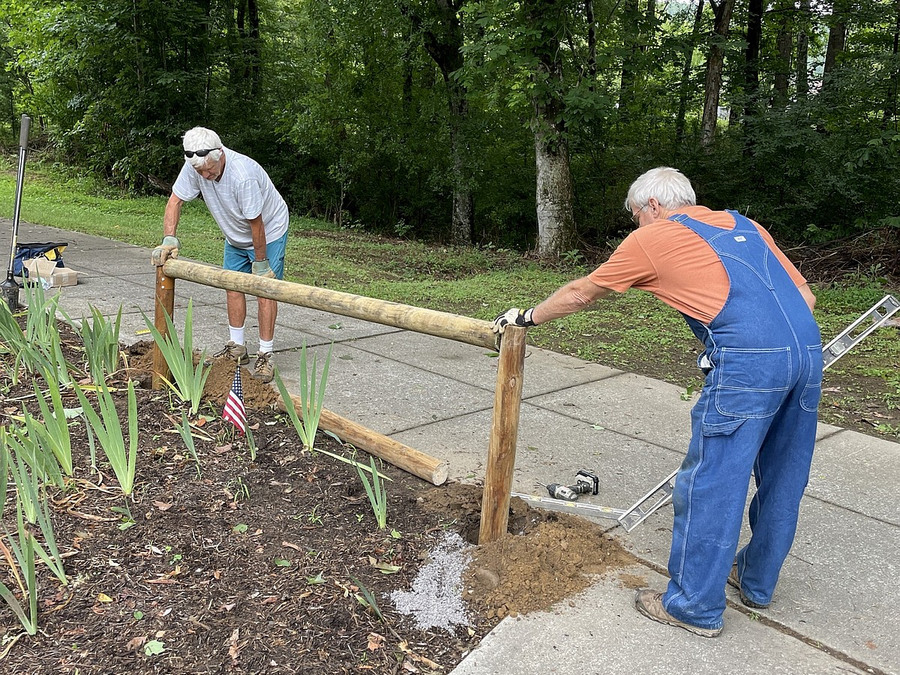 Rodney Pearson (left) and Mark Seder Installing the Border Fencing at the Iris Garden