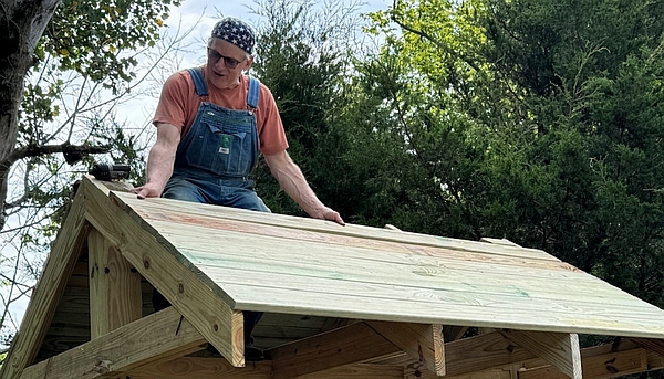 Mark Seder Finishing Up the Roof on one of the New Kiosks.